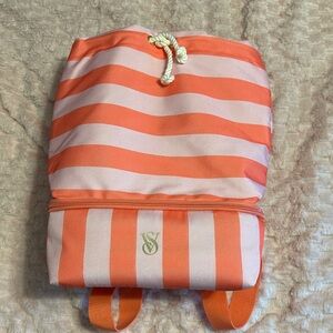 Striped Orange and Pink Backpack with cooler compartment on bottom